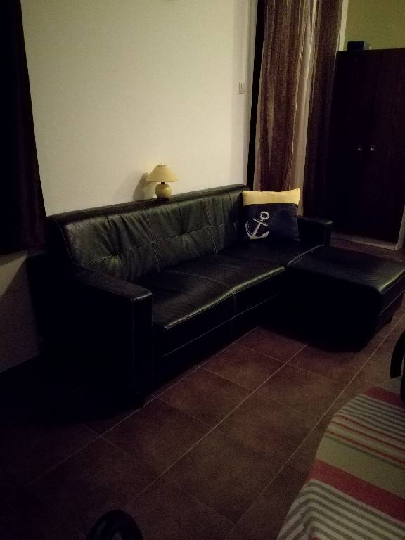 Sofa in Studio-Apartment